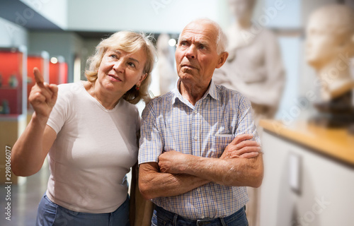 Man and woman visiting museum