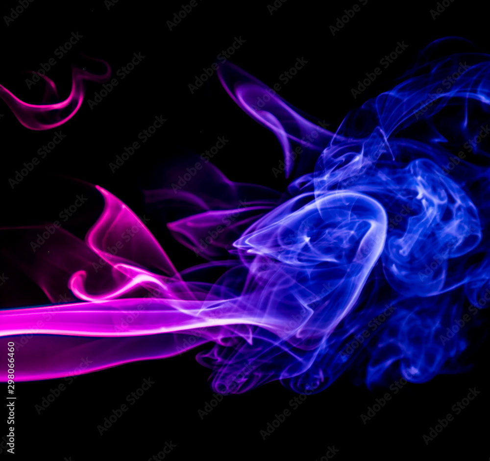 Obraz premium Colored smoke on black background
