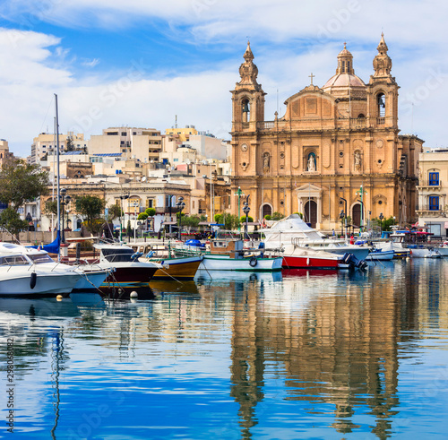 Landmarks of Malta - Msida cathedral and marina with the sail boats © Freesurf