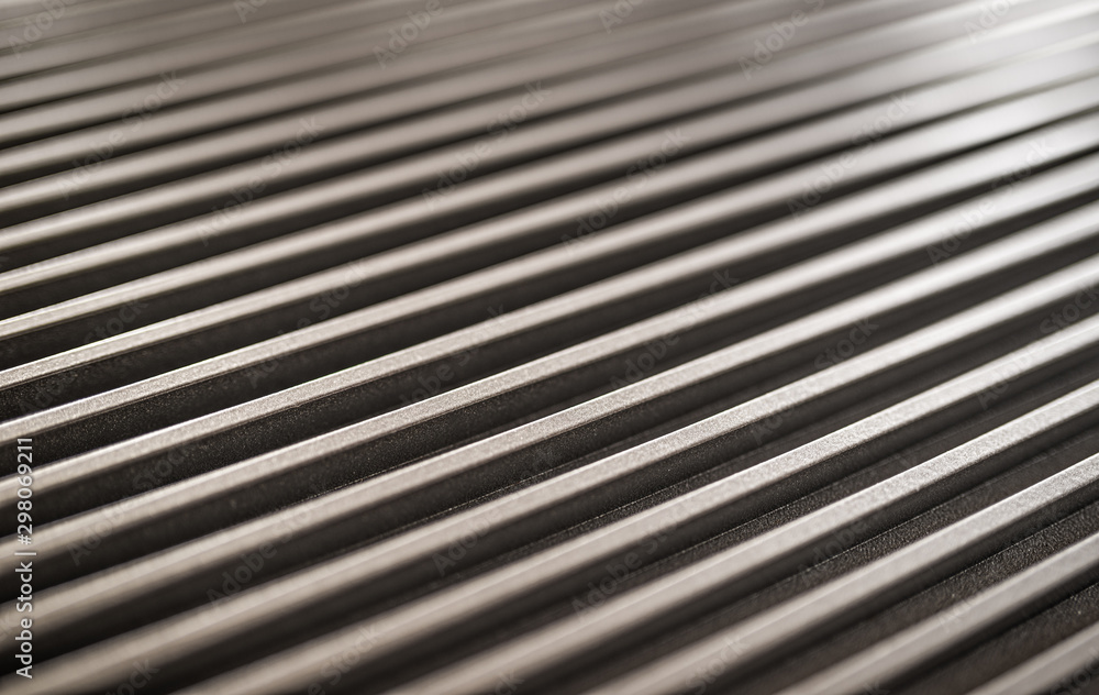 Close-up of an iron corrugated surface of a device Close-up of an iron corrugated surface of a device