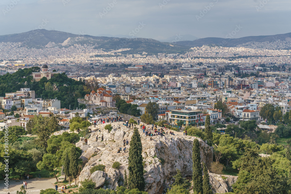 Panoramic view of the Areopagus hill and Athens City, an Ancient Rock Observation Deck in the Acropolis of Athens, Greece