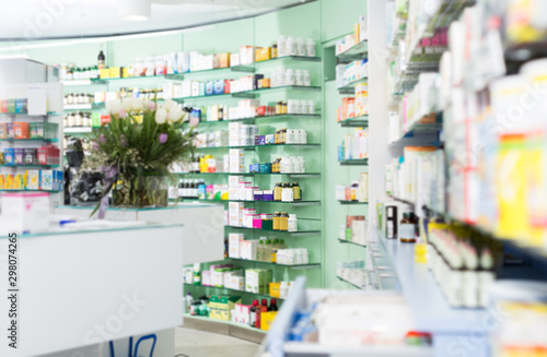 Different medicines on the shelves in the pharmaceutical store