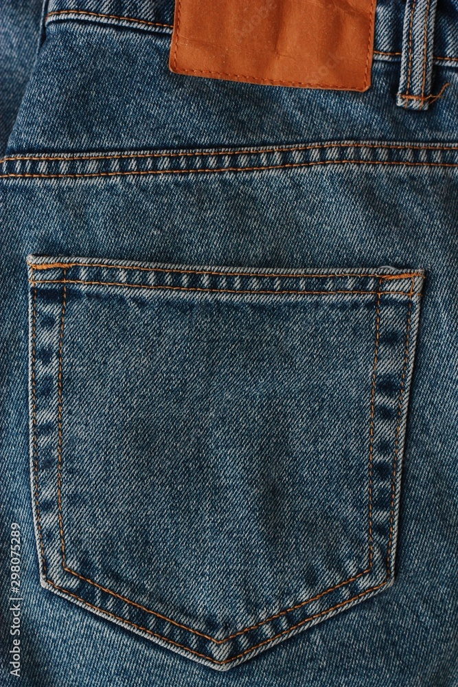 Beautiful textile blue jeans with pocket close up Beautiful textile blue jeans with pocket close up