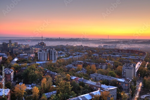 Aerial view of sun rises over summer European city