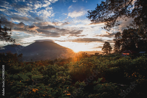 a view from the back of Mount Merapi looking towards Mount Singglang at sunset looks very beautiful and a peaceful atmosphere of nature, West Sumatra