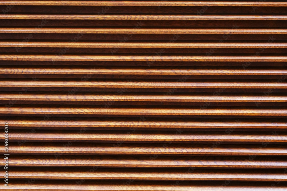 Brown louvre with horizontal lines as texture background Brown louvre with horizontal lines as texture background