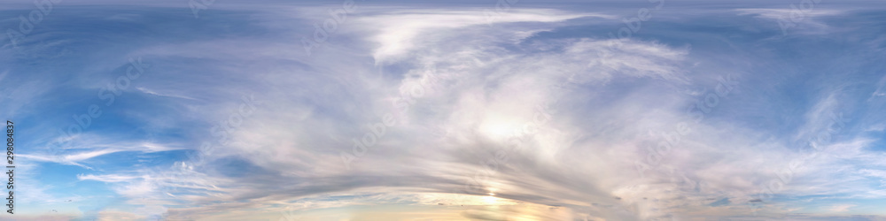 Seamless evening sky before sunset hdri panorama 360 degrees angle view with beautiful clouds  with zenith for use in 3d graphics as sky dome or edit drone shot