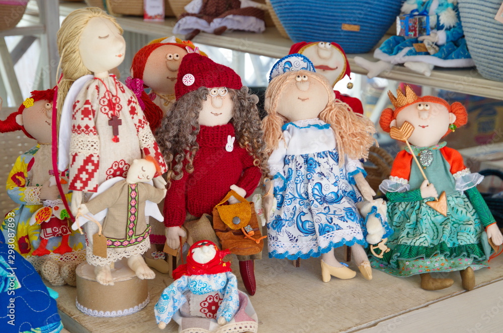Moscow, Russia - March 2, 2019: Handmade textile rag dolls in a souvenir shop