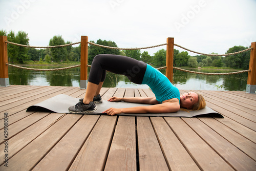 Blonde sports on the pier © Шамиль Алиев