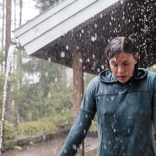 Fényképezés Woman got wet in the heavy rain