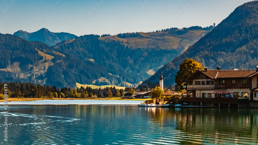 Fototapeta premium Beautiful alpine view with reflections in the famous piller lake at Saint Ulrich, Tyrol, Austria