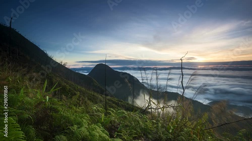 Timelapse of aerial view from mount Kenderong, Gerik Perak with moving stratus clouds photo