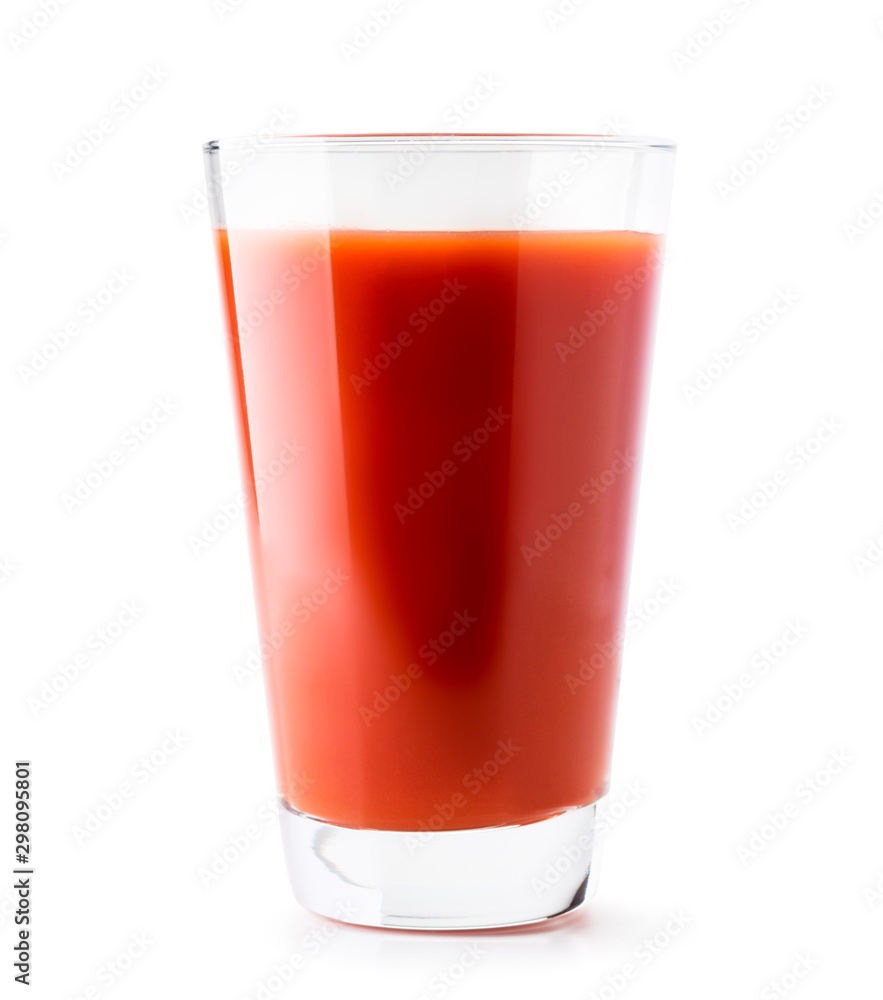 Tomato juice in a glass close-up on a white. Isolated. Tomato juice in a glass close-up on a white. Isolated.
