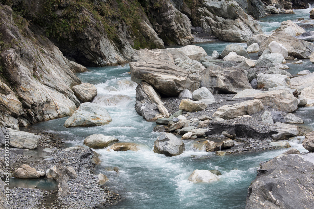 Taroko Gorge is an impressive 19-km-long canyon, situated near Taiwan's east coast. The area of the gorge is also identified as Taroko Gorge National Park. The upward thrust of hard rock, combined wit Taroko Gorge is an impressive 19-km-long canyon, situated near Taiwan's east coast. The area of the gorge is also identified as Taroko Gorge National Park. The upward thrust of hard rock, combined wit