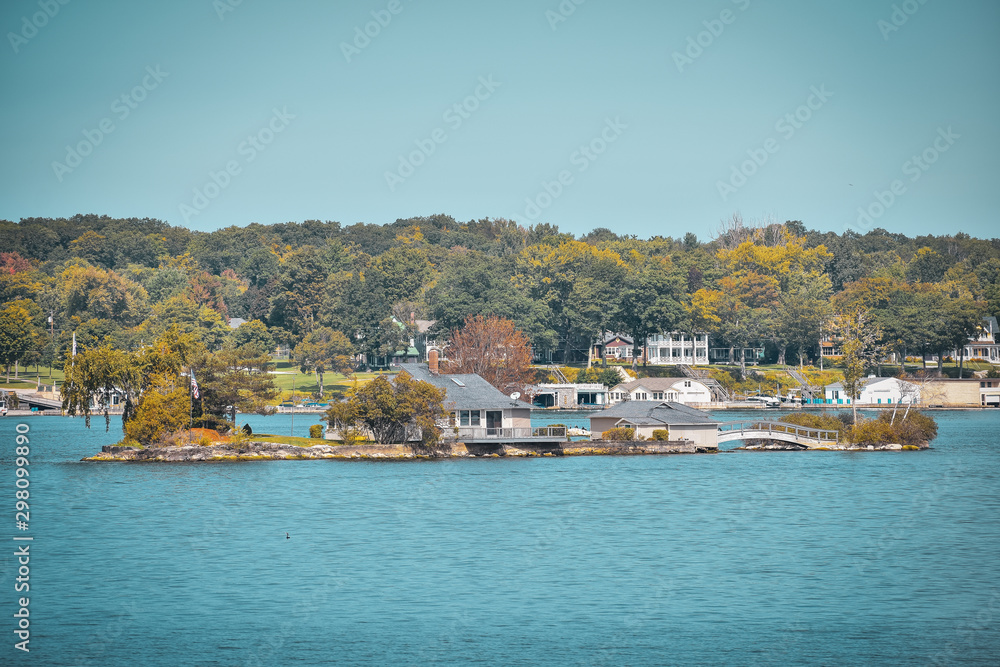 Autumn landscape in the 1000 islands. Houses, boats and islands. Lake Ontario, Canada USA