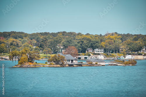 Autumn landscape in the 1000 islands. Houses, boats and islands. Lake Ontario, Canada USA