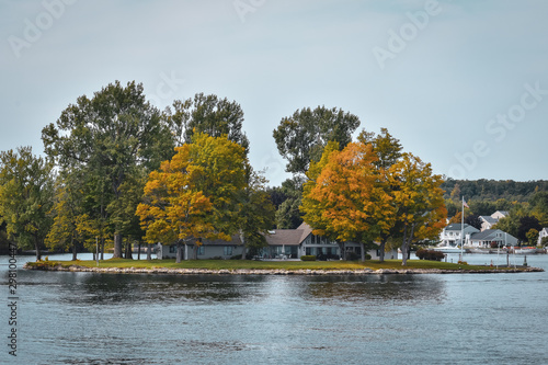 Autumn landscape in the 1000 islands. Houses, boats and islands. Lake Ontario, Canada USA © dhvstockphoto