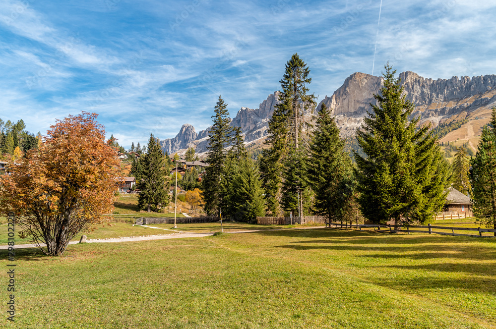 Landscape of Carezza or Karersee village in South Tyrol with Dolomites in background, Italy