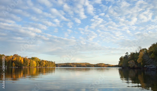 Panorama of a lake in northern Minnesota on a bright morning during autumn