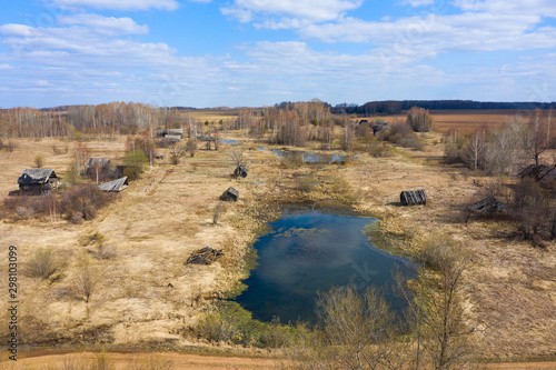 Top view of Ruins of the abandoned wooden houses in the ghost village in the European North of Russia  Kirov Region