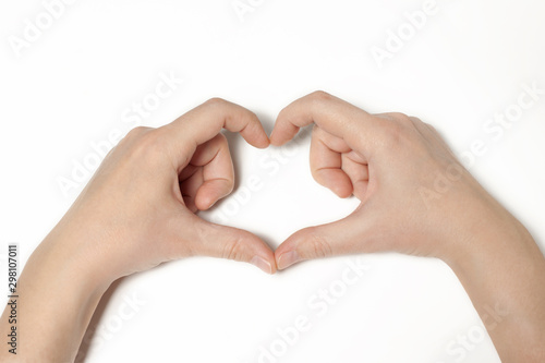 hands making symbols of love heart isolated with white background