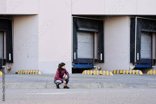 Female runner tired having break. photo