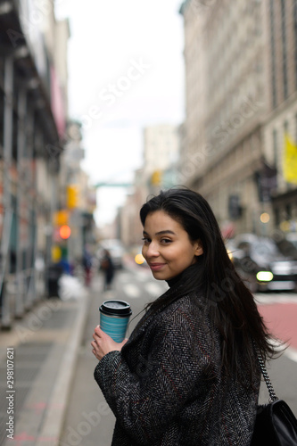 Happy working professional on street