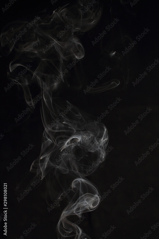 Fototapeta premium Abstract white smoke texture on black background