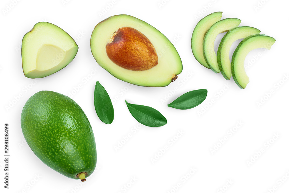 avocado and slices decorated with green leaves isolated on white background with copy space for your text. Top view. Flat lay avocado and slices decorated with green leaves isolated on white background with copy space for your text. Top view. Flat lay
