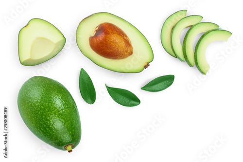 avocado and slices decorated with green leaves isolated on white background with copy space for your text. Top view. Flat lay