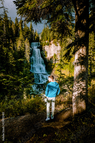 young men at Alexand falls in British Colombia Canada waterfalls Whistler photo