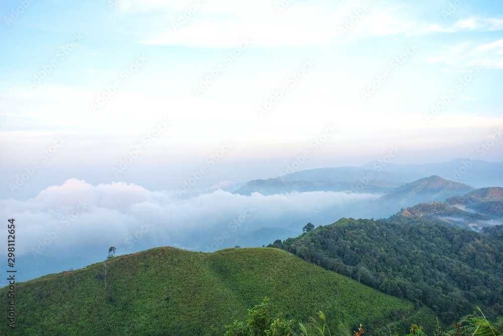 The fog that covers the I-Tong village and the mountain view at the National Elephant War Hill, Thong Pha Phum, Kanchanaburi, Thailand