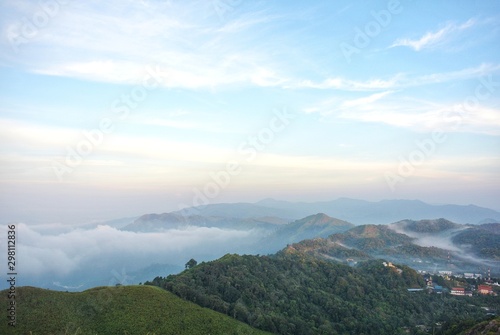 The fog that covers the I-Tong village and the mountain view at the National Elephant War Hill, Thong Pha Phum, Kanchanaburi, Thailand