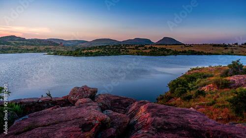 Oklahoma landscape at sunset.  Wichita Mountain Wildlife Preserve, Lawton, Oklahoma, United States. 