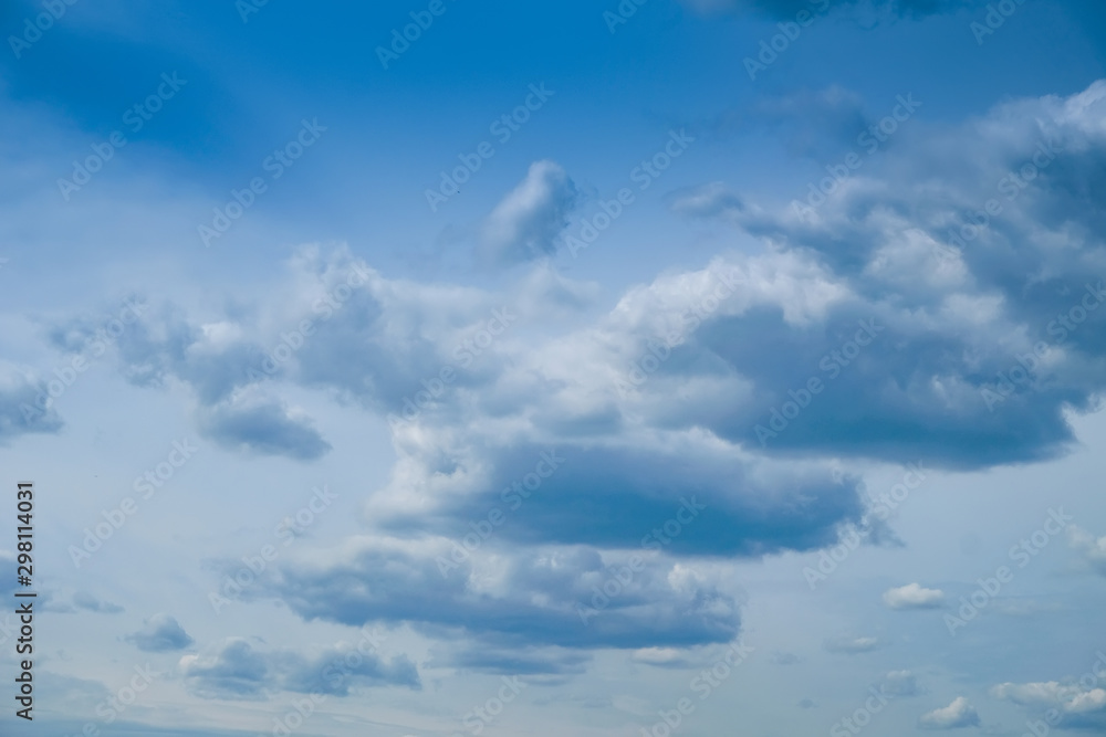 Blue sky with big beautiful white clouds. Beautiful background Blue sky with big beautiful white clouds. Beautiful background