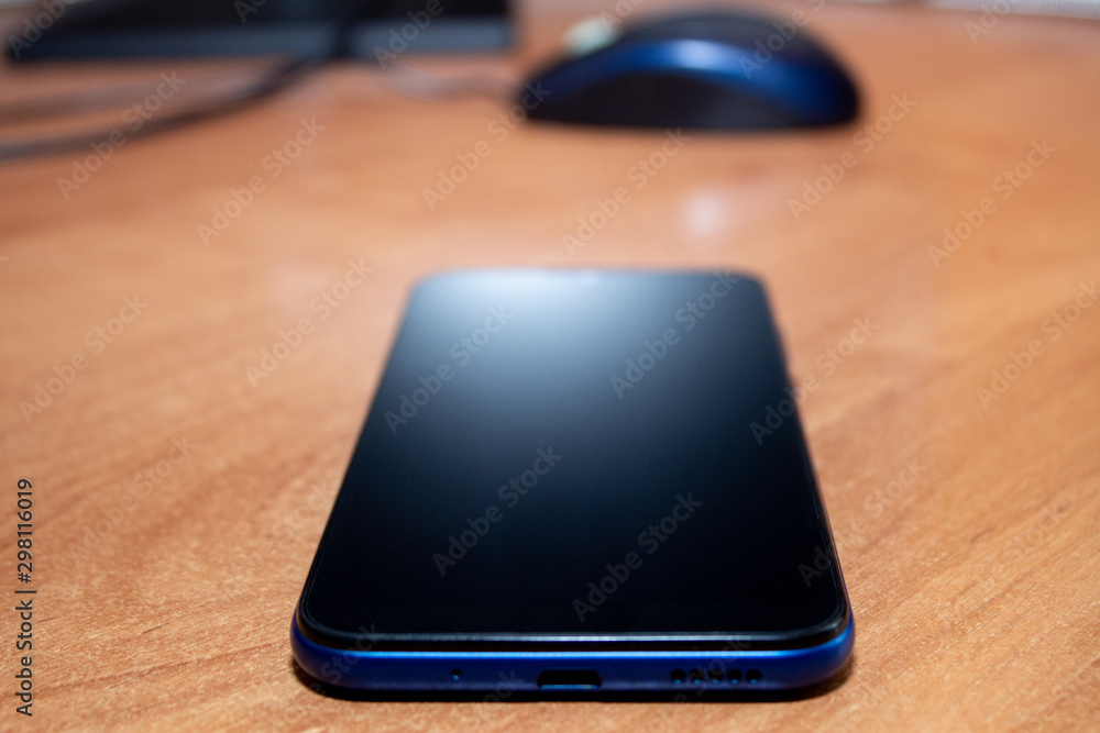smartphone lies on the desktop smartphone lies on the desktop