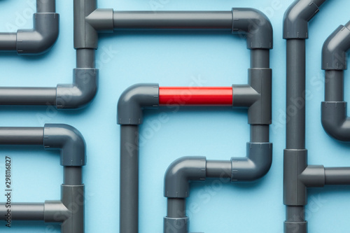 Red element in connection of gray pipes