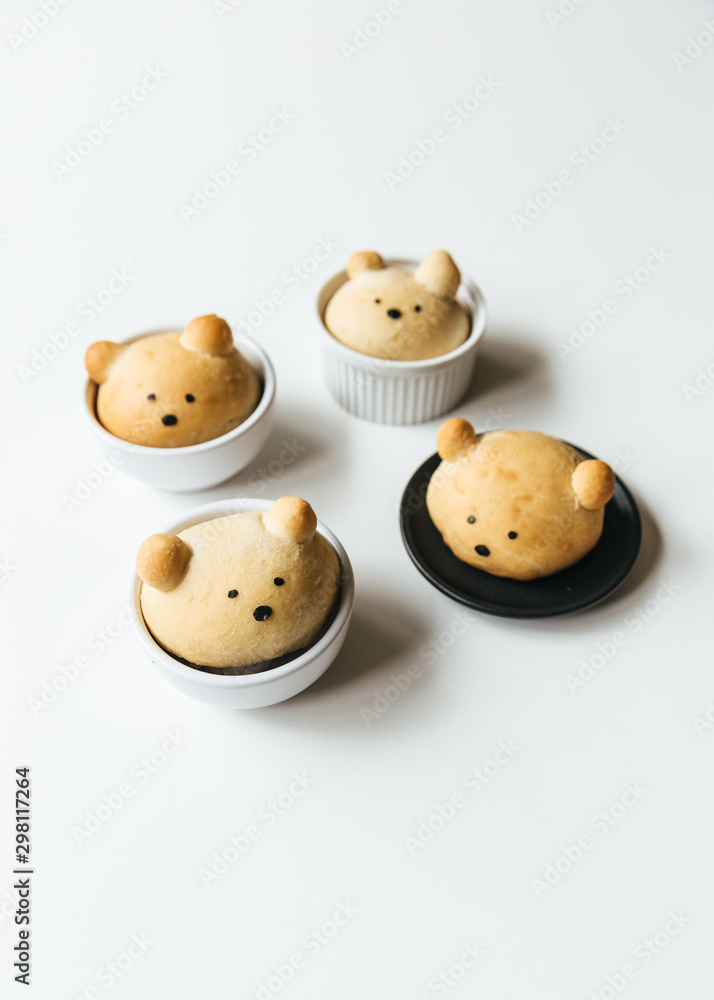Homemade bear bread buns in ramekins Homemade bear bread buns in ramekins