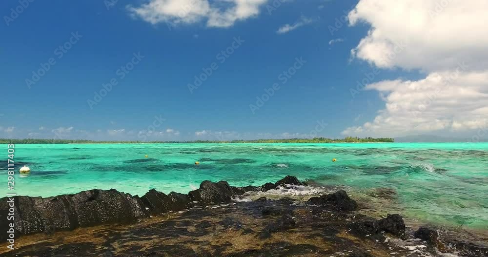 Drone Flying Over a Rocky Shallow Water on a Tropical Island Drone Flying Over a Rocky Shallow Water on a Tropical Island