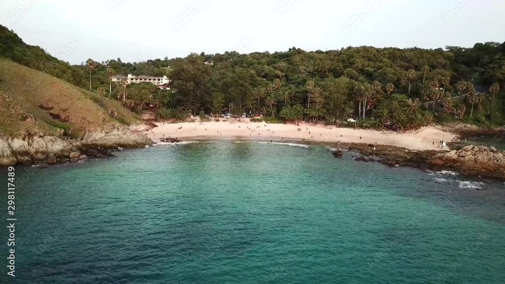 From the sea fly forward to the beach with many people at Yanui beach From the sea fly forward to the beach with many people at Yanui beach