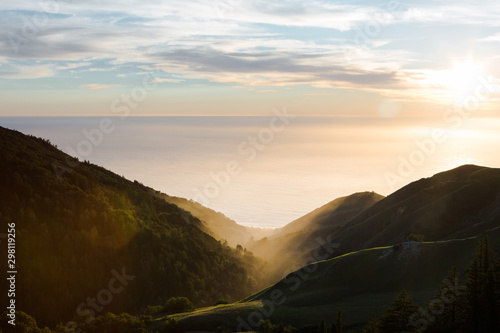 Sunset Over Coastal Mountains and Ocean photo