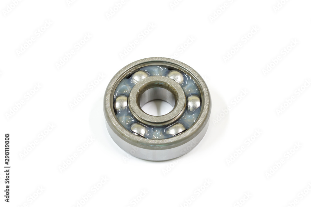 Ball bearing on a white background, Motorcycle bearing close-up. Ball bearing on a white background, Motorcycle bearing close-up.