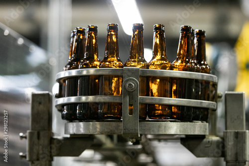 Brewery: Empty Bottles Move Through Production Bottling Line photo