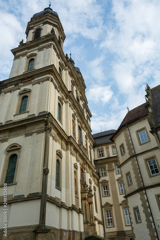 Picturesque baroque abbey church facade with many details.