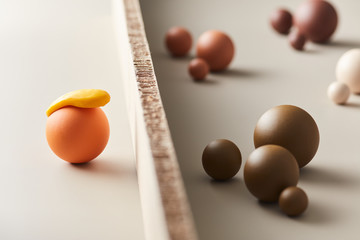 Multicolored balls for concept of immigrants behind border