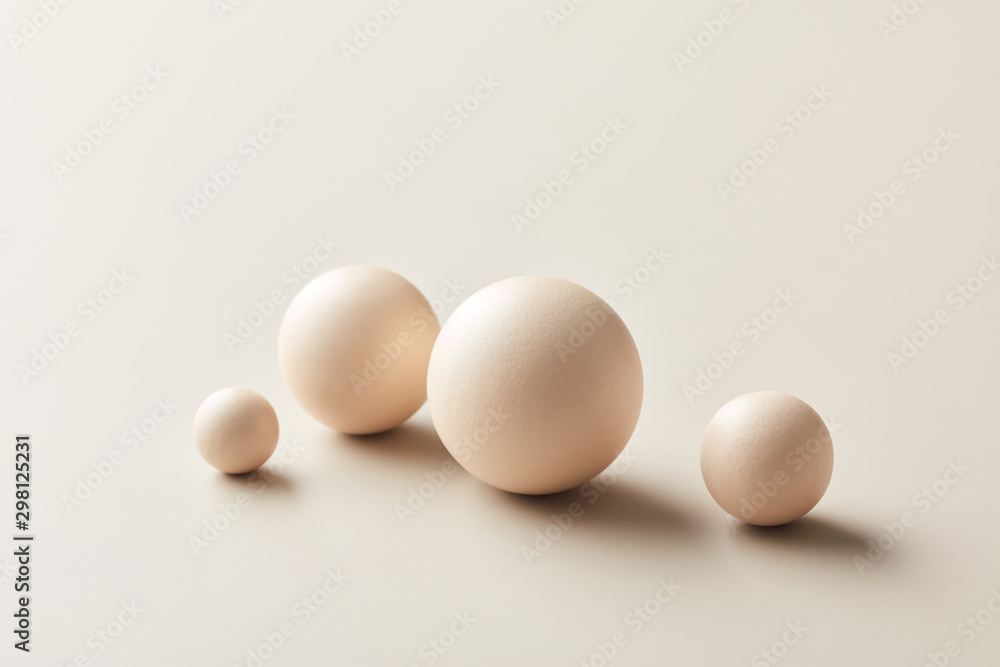 Set of white balls in different sizes Set of white balls in different sizes