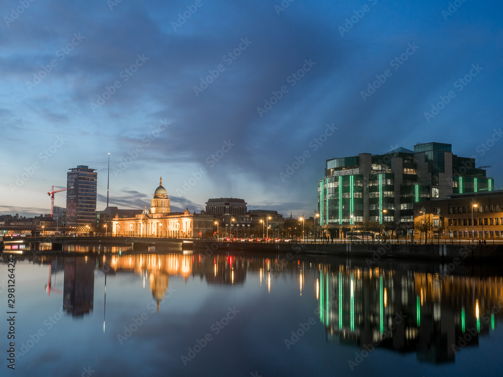 City lights reflecting in the river Liffey in Dublin, Ireland