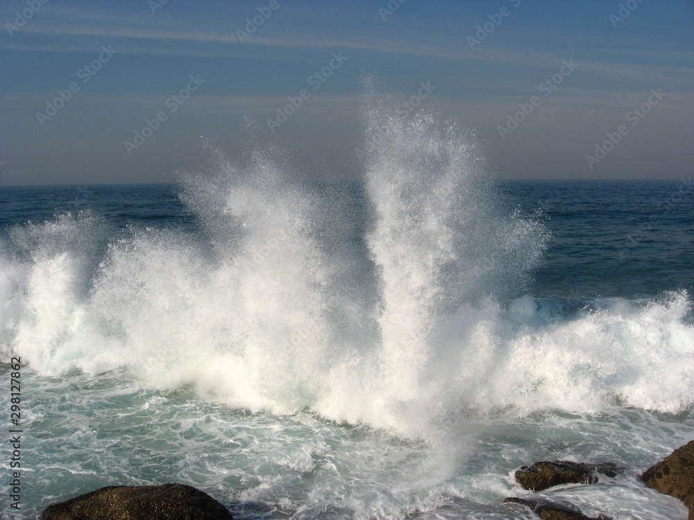 Large splash as wave hits rock on Natal coast.