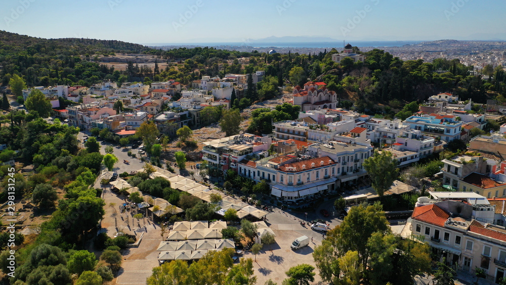 Aerial drone photo of popular picturesque area of Thiseio with great views to Acropolis hill and the Parthenon and great pedestrian road of Dionisiou Areopagitou, Athens, Attica, Greece