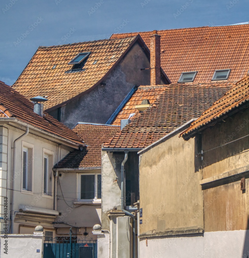old traditional Alsatian buildings with ceramic tile roofs